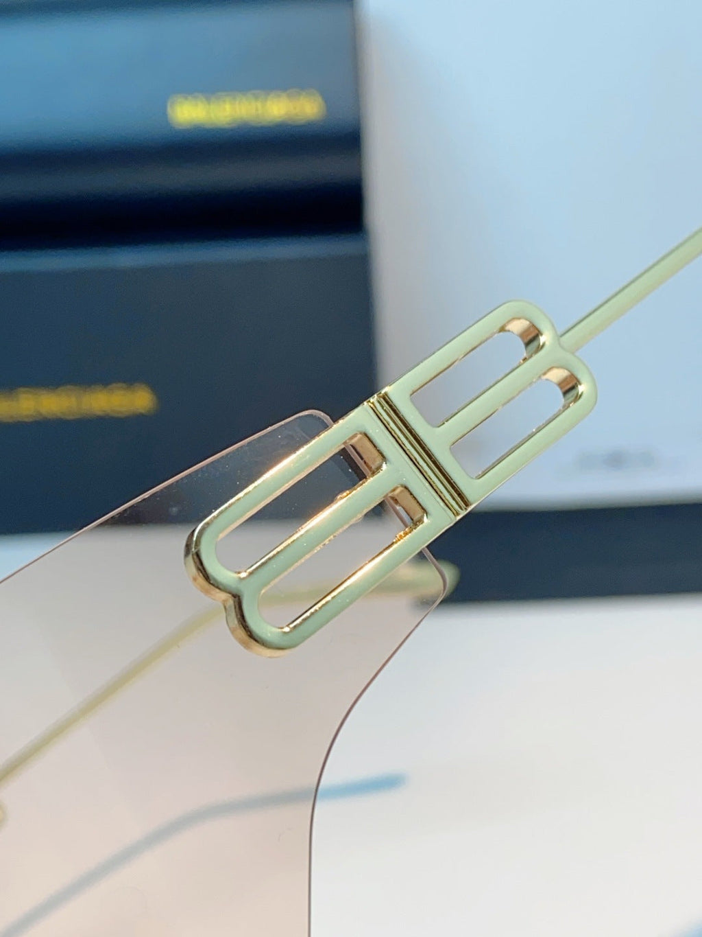 Balenciaga Lightweight Rimless Gold Lens Sunglasses for Men & Women - detail image 8