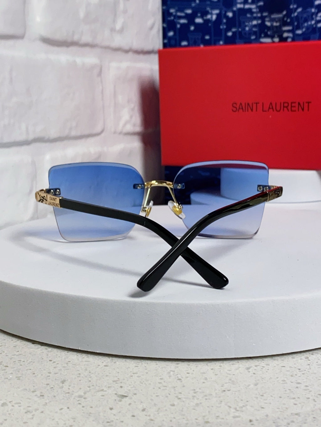Saint Laurent Lightweight Rimless Blue Lens Sunglasses for Men & Women - detail image 3
