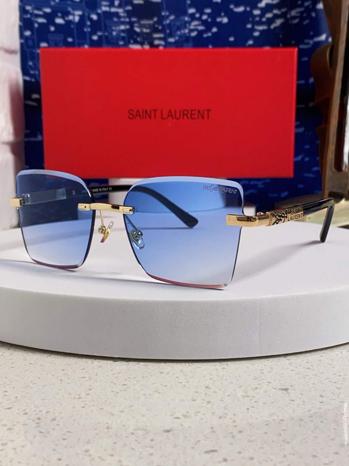Saint Laurent Lightweight Rimless Blue Lens Sunglasses for Men & Women