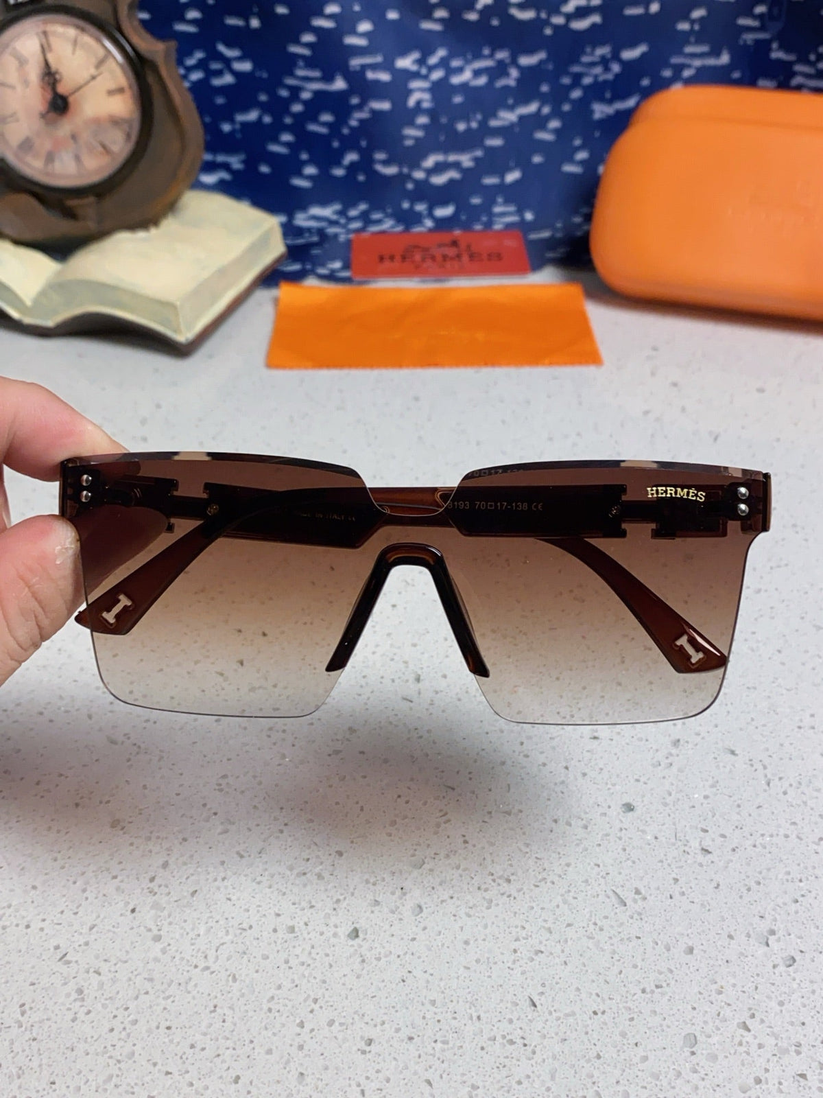 Hermès Lightweight Rimless Red Lens Sunglasses for Women - detail image 4